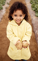 Image showing Child, portrait or holding potatoes harvest in greenhouse farm, agriculture field or nature environment in export logistics sales. Smile, happy or farming kid with vegetables, ground food or produce