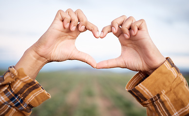 Image showing Heart hands, agriculture and farming and countryside for sustainability, farming or agro business people in industry. Love emoji sign, farmer couple and plants growth on field sustainable development