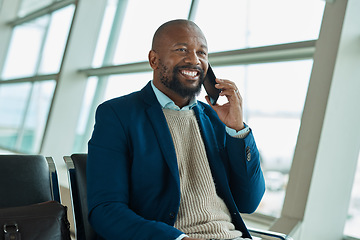 Image showing Black man, phone call and smile at airport for business travel, trip or communication waiting for flight. Happy African American male smile in conversation or discussion on smartphone for traveling