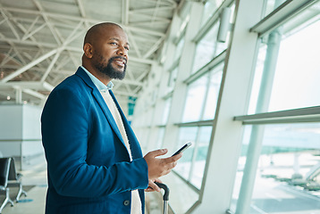 Image showing Black man, phone and thinking at airport window for business travel, trip or communication waiting for flight. African American male with smile contemplating schedule or plain times on smartphone