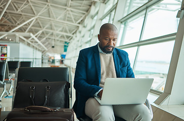 Image showing Airport travel, laptop and business man review finance portfolio feedback, stock market database or investment. Online economy, forex account manager and African trader trading NFT, bitcoin or crypto