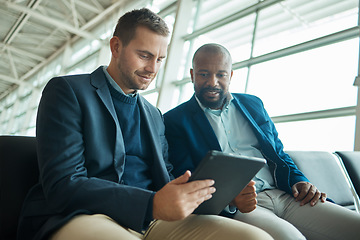 Image showing Tablet, businessman or people at airport meeting for flight update, travel news or schedule planning. Teamwork, lobby and technology of international corporate or entrepreneur black man with partner