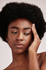 Image showing Black woman, skincare and beauty secret of a model with skin glow from dermatology. Facial, self care and wellness of an African female in a isolated white background in a studio with cosmetics