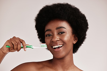 Image showing Brushing teeth, black woman and toothbrush portrait for clean and healthy mouth on studio background. Face of happy person advertising dentist tips for dental care, hygiene and cleaning with a smile