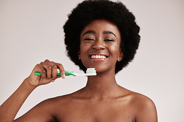 Image showing Black woman, brushing teeth and toothbrush portrait for clean and healthy mouth on studio background. Face of happy person advertising dentist tips for dental care, hygiene and cleaning with a smile