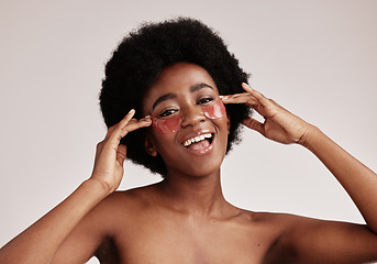 Image showing Skin care, eye and face mask on black woman in studio happy with dermatology cosmetic product. Aesthetic model with hands for collagen patch for health, wellness and facial skin glow grey background