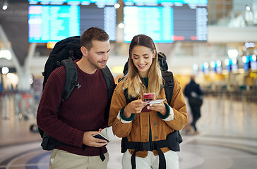 Image showing Happy couple, airport and phone with ticket, travel app and adventure with excited face, conversation and smile. Man, woman and smartphone for digital booking of hotel, taxi or bus for transportation