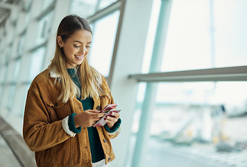 Image showing Travel, phone and woman with passport at airport lobby for social media, internet browsing or web scrolling. Vacation, mobile technology and female with smartphone and document for global traveling.