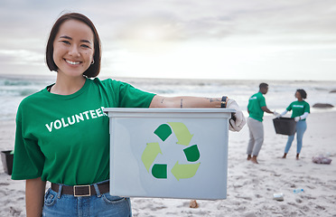 Image showing Cleaning, recycle and portrait of asian woman at beach for plastic, environment or earth day. Recycling, sustainability and climate change with volunteer and trash for pollution and eco friendly