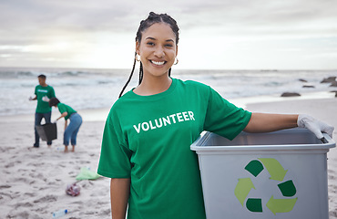 Image showing Cleaning, recycle and portrait of black woman at beach for plastic, environment or earth day. Recycling, sustainability and climate change with volunteer and trash for pollution and eco friendly