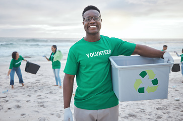 Image showing Cleaning, recycle and portrait of black man at beach for plastic, environment or earth day. Recycling, sustainability and climate change with volunteer and trash for pollution and eco friendly