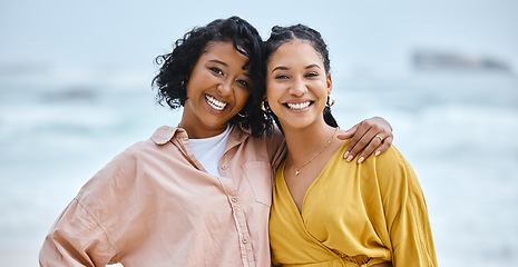 Image showing Beach, hug and portrait of couple of friends for lgbtq, lesbian or love and freedom on vacation together with ocean water. Black woman and partner on date, fun and excited for sea, valentines holiday