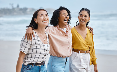 Image showing Friends, diversity and beach, hug and walk while laughing, relax and talking against nature background. Travel, women and group embrace while walking at the sea, happy and smile on ocean trip in Bali