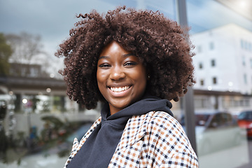 Image showing Selfie, portrait and black woman in city for travel, fun and vacation on window background space. Face, social media or girl influencer live streaming for online audience, blog or followers in London