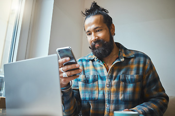 Image showing Remote work, phone or cafe man on laptop planning on web store networking, social media or B2B sale. Small business or startup on smartphone for communication, networking or research in restaurant