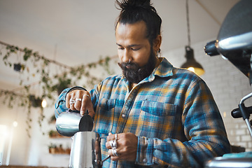 Image showing Barista in cafe, latte art and process with man, working and design with milk foam and espresso. Small business, production and workflow, service and creative with focus and artistic in coffee shop