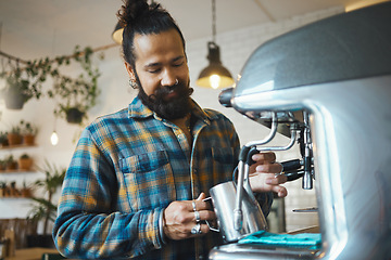 Image showing Coffee shop, startup and waiter with a man barista behind the counter to prepare a drink. Cafe, kitchen and service with a male working in a restaurant as an entrepreneur or small business owner