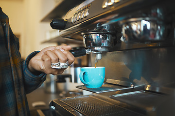 Image showing Coffee shop machine handle, hand of barista brewing espresso in restaurant and closeup of hot water beverage in cafe. Caffeine drink in mug, person holding tool on morning in kitchen and breakfast