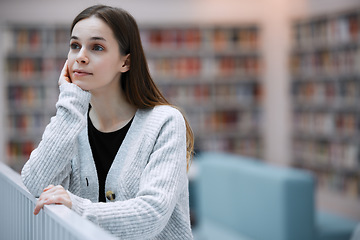 Image showing University, thinking and student in library for books, knowledge and academic research for course. Education, college and young woman with ideas, vision and success mindset for future career goals