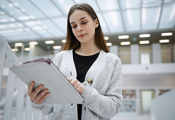 Image showing Social media, student or woman with tablet in library for research, education or learning. Networking, focus or girl on tech for scholarship study, search or planning school project at college campus