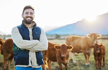 Image showing Sustainability, confidence and portrait of farmer with cows on field, happy countryside farming with dairy and beef production. Nature, meat or milk farm, sustainable business, agriculture and food.