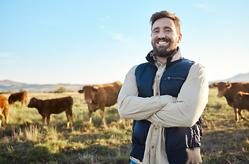 Image showing Farming, confidence and cows and portrait of man with smile on field, happy farm in countryside with dairy and beef production. Nature, meat and milk farmer, sustainable business in food industry.