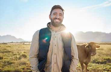 Image showing Smile, farming and portrait of man with cow on field, happy farmer in countryside with dairy and beef production. Nature, meat and eco milk farm, sustainability and small business in food industry.