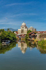 Image showing church with scaffolding and poor houses manado, indonesia