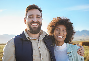 Image showing Smile, cow and portrait of interracial couple on farm for agriculture, partnership or growth. Teamwork, animal and hug with man and black woman in grass field for sustainability, agro or environment