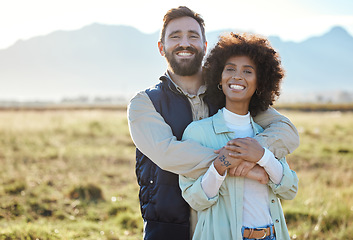 Image showing Love, portrait and hug with interracial couple on farm for agriculture, mockup and growth. Teamwork, happy and nature with man and black woman in grass field for sustainability, agro and environment