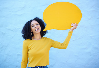 Image showing Speech bubble, portrait and black woman in studio for advertising, mockup and space on blue background. Face, girl and billboard, branding and paper for product placement, marketing and copy space