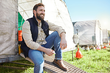 Image showing Man, thinking and chicken farm on countryside grass, land or field with ideas, vision or success mindset for food industry. Smile, happy and relax poultry farmer with agro export motivation in nature