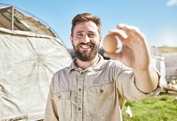 Image showing Farm, agriculture and portrait of farmer with egg for inspection, growth production and food industry. Poultry farming, organic and man with chicken eggs for order, protein market and quality control