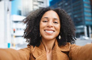 Image showing Black woman, city and selfie with smile, sunshine and urban adventure on sidewalk in summer. Girl, outdoor and street for digital photo, profile picture or web app with happiness, holiday or travel