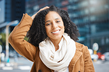 Image showing Travel, portrait and black woman in a city, happy and smile on vacation against urban background. Face, smile and tourist on holiday on New York, cheerful and relax downtown for fun, freedom or break