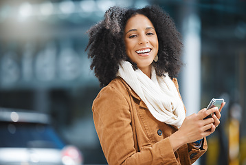Image showing Cellphone, street and portrait of a black woman in the city networking on social media, mobile app or internet. Happiness, smile and African female typing text message on a phone and walking in town.