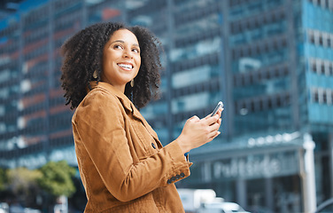 Image showing Phone, city and thinking black woman for travel, communication or social media networking on way to work. Walking, 5g technology and young person ideas on smartphone, mobile or chat in urban street