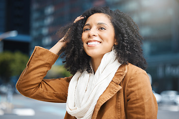 Image showing Travel, freedom and black woman in a city, happy and smile on vacation against urban background. Face, smile and tourist on holiday on New York, cheerful and relax downtown for fun, journey or break