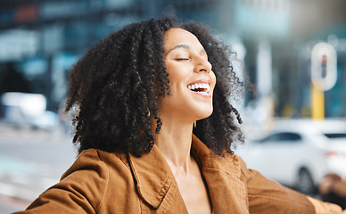 Image showing Happy, freedom and black woman in a city for travel, vacation and holiday against an urban background. Smile, free and living girl in New York for break, explore and journey with happiness and mockup