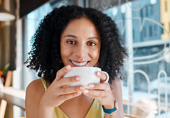 Image showing Happy black woman, portrait and relax in coffee shop, restaurant or bistro for lunch, latte and smile. Face, cafe and young female enjoy cup of tea drink, cappuccino and break alone with happiness