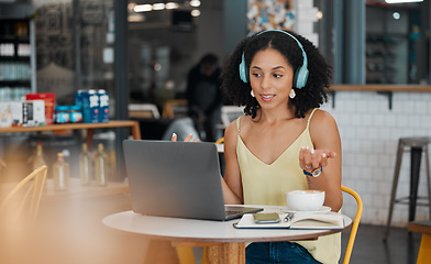 Image showing Video call, laptop and black woman in coffee shop for meeting, virtual conference and networking. Communication, remote work and freelance girl on computer talking, speaking and in discussion in cafe