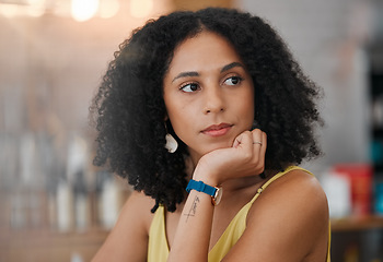 Image showing Black woman, face and thinking in cafe for business idea, vision or wondering in thought waiting for service. African American female contemplating in wonder sitting relaxed indoors at a coffee shop