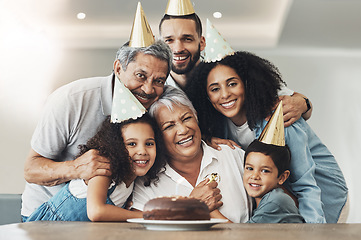 Image showing Family, portrait and happy birthday celebration with a hug for senior woman with a cake, love and care. Children, parents and grandparents together for party to celebrate excited grandma with dessert