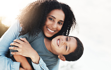 Image showing Happy family hug, portrait and child and mom bonding, playing and enjoy quality time together in nature park. Vacation face, love smile and outdoor people on relax holiday in Rio de Janeiro Brazil