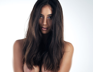 Image showing Dont let anyone ever dull your sparkle. Cropped portrait of an attractive young woman posing nude against a gray background in the studio.