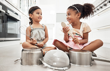 Image showing Girl kids playing house with pots as drums, happy and care free at family home, make believe with music and fun. Noise, metal and children on floor, play date together and fantasy with imagination