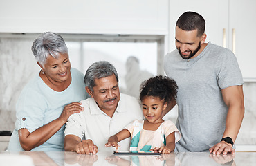 Image showing Learning, big family and girl with tablet in home, playing online games or educational app. Bonding, touchscreen or care of happy grandparents and father teaching kid how to use technology in kitchen