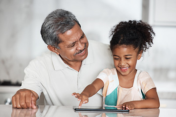 Image showing Learning, grandfather and girl with tablet in home, playing online games or educational app. Family bonding, touchscreen or care of happy grandpa teaching child how to use digital technology in house