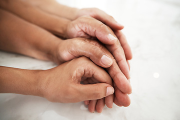 Image showing Family, love and hands together with child, mother and father on mockup space with care and support. Group of people together for trust, help and hope on a table in a house for kindness and security