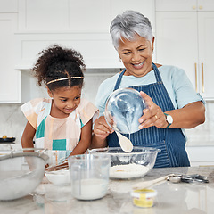 Image showing Learning, cooking and grandmother with girl in kitchen mixing milk and flour in bowl. Education, family care and happy grandma teaching child how to bake, bonding and enjoying baking time together.